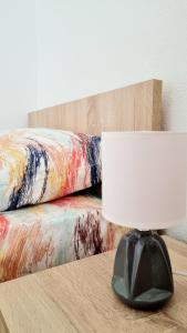 Ένα ή περισσότερα κρεβάτια σε δωμάτιο στο Rooms LikeHome