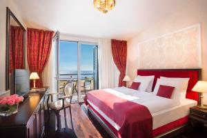 Rúm í herbergi á Hotel Kvarner - Liburnia