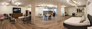 a large room with a bed and a living room at Casa Crognale in Lanciano