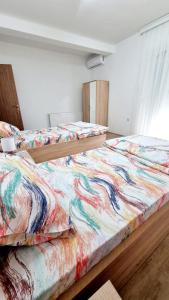 Ένα ή περισσότερα κρεβάτια σε δωμάτιο στο Rooms LikeHome