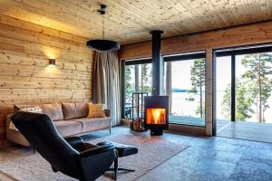 Posezení v ubytování Saunamäki Resort K - Luxury Designer Seafront Villa