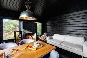 Posezení v ubytování Saunamäki Resort K - Luxury Designer Seafront Villa