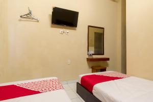 Fotografie z fotogalerie ubytování Capital O 615 Residence Puri Hotel Syariah v destinaci Medan