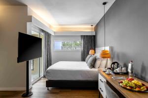 Postel nebo postele na pokoji v ubytování Prima City Hotel + 37 fotografií