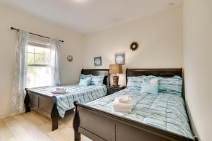 A bed or beds in a room at New Home Close To Disney Bliss!