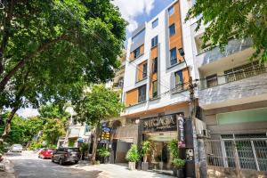a street with a building on the side of the road at MICASA HOTEL in Ho Chi Minh City