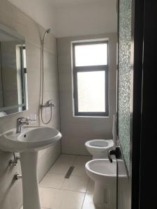 Beach Apartment tesisinde bir banyo