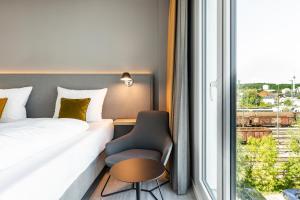 Maxx Hotel Aalen客房内的一张或多张床位