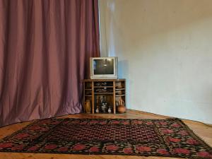 TV a/nebo společenská místnost v ubytování Guest House Aleksandre