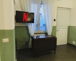 Televiisor ja/või meelelahutuskeskus majutusasutuses "CITY CENTER 10Stars"- Casetta Matteotti- Feel like HOME