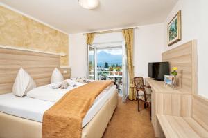 Ein Bett oder Betten in einem Zimmer der Unterkunft Hotel-Pension Melcher