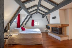 Voodi või voodid majutusasutuse Tralala Hotel Montreux toas