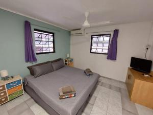 Postel nebo postele na pokoji v ubytování Kas di Ala apartments