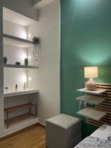 A bed or beds in a room at 1 BedRoom Apt - Live Like A Local In Kolonaki