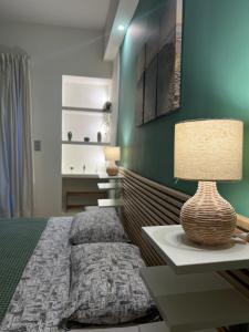 A bed or beds in a room at 1 BedRoom Apt - Live Like A Local In Kolonaki