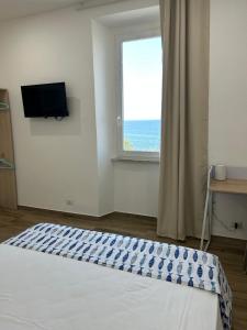 TV a/nebo společenská místnost v ubytování Stella di Mare- Cruise Shuttle