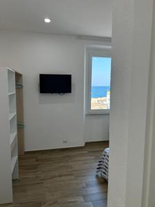 TV a/nebo společenská místnost v ubytování Stella di Mare- Cruise Shuttle