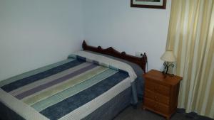 Postel nebo postele na pokoji v ubytování Hostal Cuesta de Belén