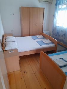 Postel nebo postele na pokoji v ubytování Anita Guest House
