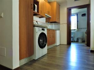 A kitchen or kitchenette at Caseria de Comares Apartments 104