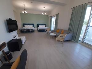 TV a/nebo společenská místnost v ubytování Green Grass B&B