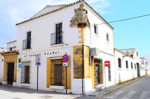 a building on the side of a street at Baobab Hostal in El Puerto de Santa María