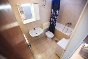 Ванная комната в Apartmani Nada & Darko, Kampor, Rab, Hrvatska