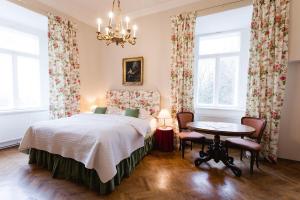 Posteľ alebo postele v izbe v ubytovaní Schloss Ernegg