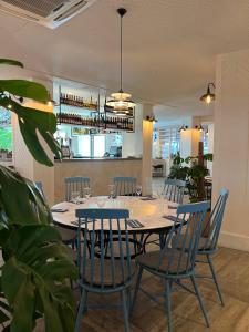 a dining room with a table and chairs at Gran Hotel Flamingo-Adults Only older 18 years old in Lloret de Mar