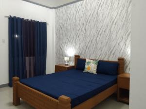 Krevet ili kreveti u jedinici u okviru objekta ELEN INN - Malapascua Island FAN ROOM #2