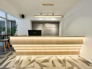 TV a/nebo společenská místnost v ubytování Sleep Box Penang
