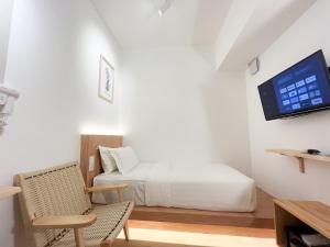 TV a/nebo společenská místnost v ubytování Sleep Box Penang