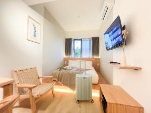 TV a/nebo společenská místnost v ubytování Sleep Box Penang