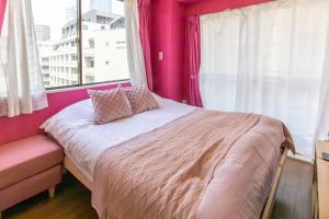 Krevet ili kreveti u jedinici u okviru objekta Azabukumai building