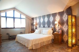 Postel nebo postele na pokoji v ubytování Hotel Katxi