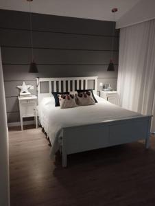 Postel nebo postele na pokoji v ubytování Quinta dos Loureiros