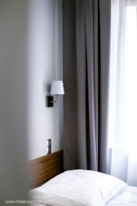 Posteľ alebo postele v izbe v ubytovaní Hotel Crystal