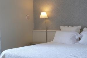 Postel nebo postele na pokoji v ubytování Chambre d'Hôtes de L'Abricotier