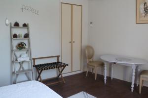 Postel nebo postele na pokoji v ubytování Chambre d'Hôtes de L'Abricotier