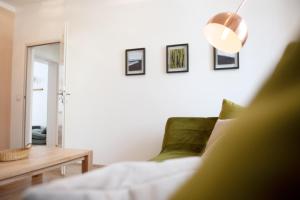 Posteľ alebo postele v izbe v ubytovaní Kiwi Apartment Vienna