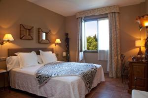 Postel nebo postele na pokoji v ubytování Hotel Katxi