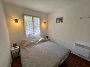 Postel nebo postele na pokoji v ubytování Bella Vista 34 , T2 vue mer, piscine ,climatisé Porticcio