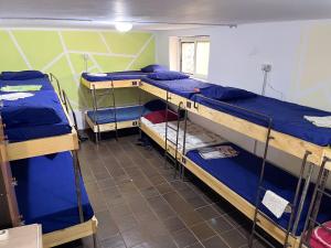 Postel nebo postele na pokoji v ubytování Milingona City Center Hostel