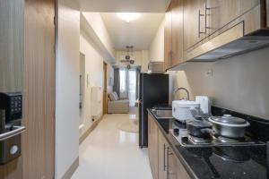 A kitchen or kitchenette at Shore 3 Residences, Mall of Asia Complex