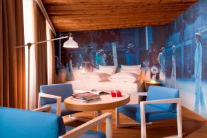 A seating area at Small Luxury Hotel Goldgasse