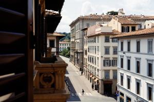 a view of a city street with buildings at Hotel Palazzo Ognissanti in Florence