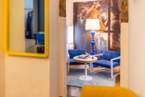 A seating area at Small Luxury Hotel Goldgasse
