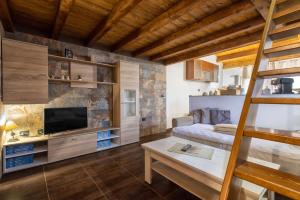 TV a/nebo společenská místnost v ubytování Beb Mediterraneo Guest House