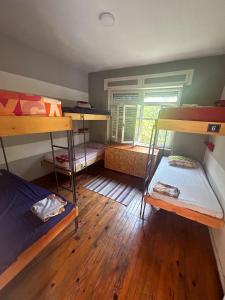 Postel nebo postele na pokoji v ubytování Milingona City Center Hostel