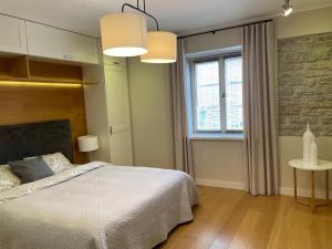 Postel nebo postele na pokoji v ubytování Uus 30 Apartments